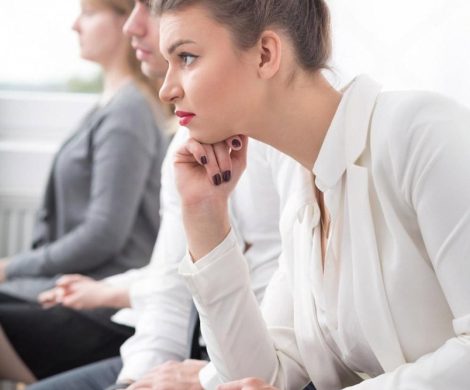 Patients sitting in a hospital waiting room in the UAE showing signs of waiting anxiety
