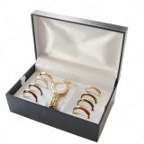 Open presentation box with automatic watch and accessories, illustrating watch winder storage in Dubai